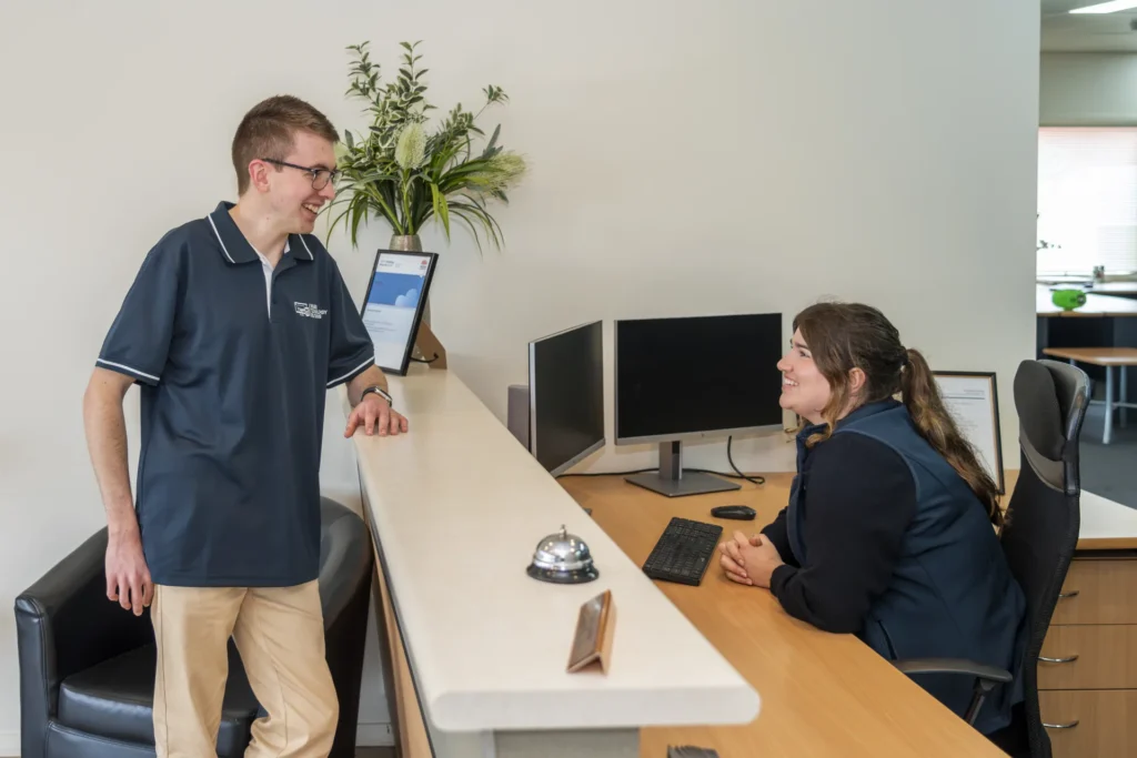 Alex talking with a client on-site in Wagga