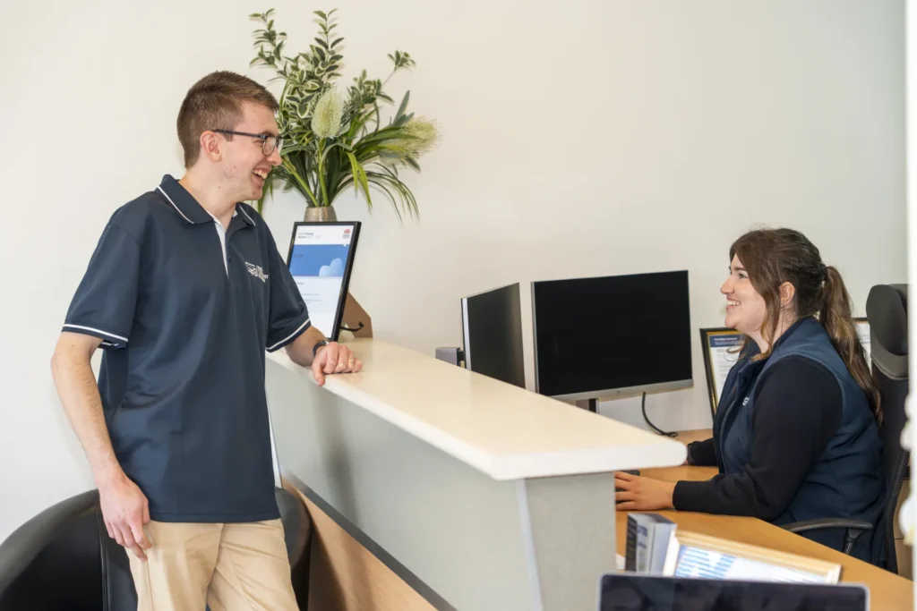 Alex talking with a client on-site in Wagga